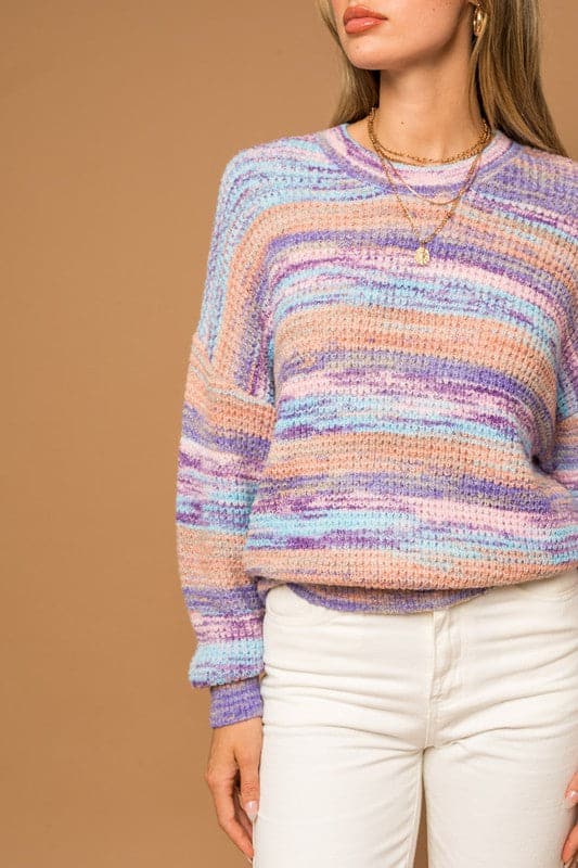 This sweater is the perfect addition to your closet. It’s cozy, long sleeve and pairs well with jeans, skirts and leggings! The crew neck is on trend and would look super cute peeking out of a cool leather jacket. Avah Couture