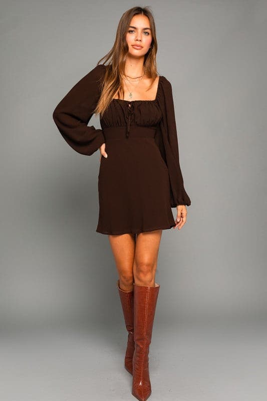 Fall in love with the puff sleeve dress this fall and winter season. This mini dress features a trendy square neckline, puff sleeves, and an empire waist. The dress is both cute and comfortable and can be worn to work or on the weekend. Pair it with knee high boots for an even more stylish look.  Avah Couture