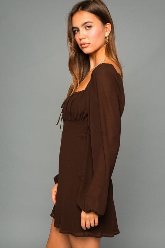 Fall in love with the puff sleeve dress this fall and winter season. This mini dress features a trendy square neckline, puff sleeves, and an empire waist. The dress is both cute and comfortable and can be worn to work or on the weekend. Pair it with knee high boots for an even more stylish look.  Avah Couture