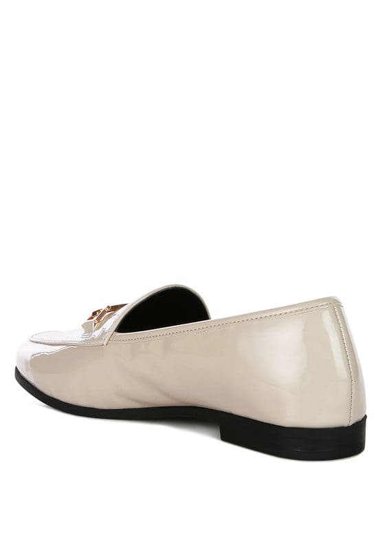 Soft, stylish and chic! These faux leather semi casual loafers are perfect for work and beyond. Featuring shiny golden metal sling detail, these loafers will take you look up a notch. The super soft faux leather upper makes it effortless to slip on and get out the door in style while providing ultimate comfort. Avah Couture