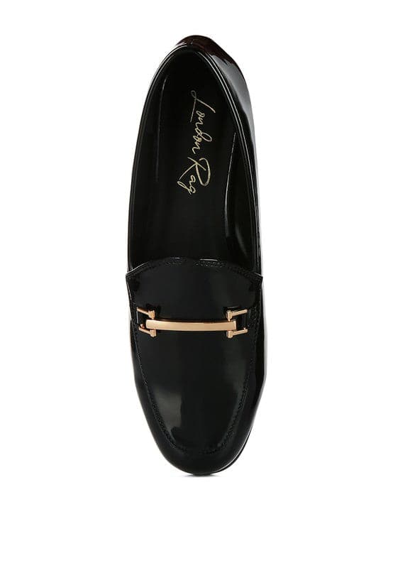 Soft, stylish and chic! These faux leather semi casual loafers are perfect for work and beyond. Featuring shiny golden metal sling detail, these loafers will take you look up a notch. The super soft faux leather upper makes it effortless to slip on and get out the door in style while providing ultimate comfort. Avah Couture