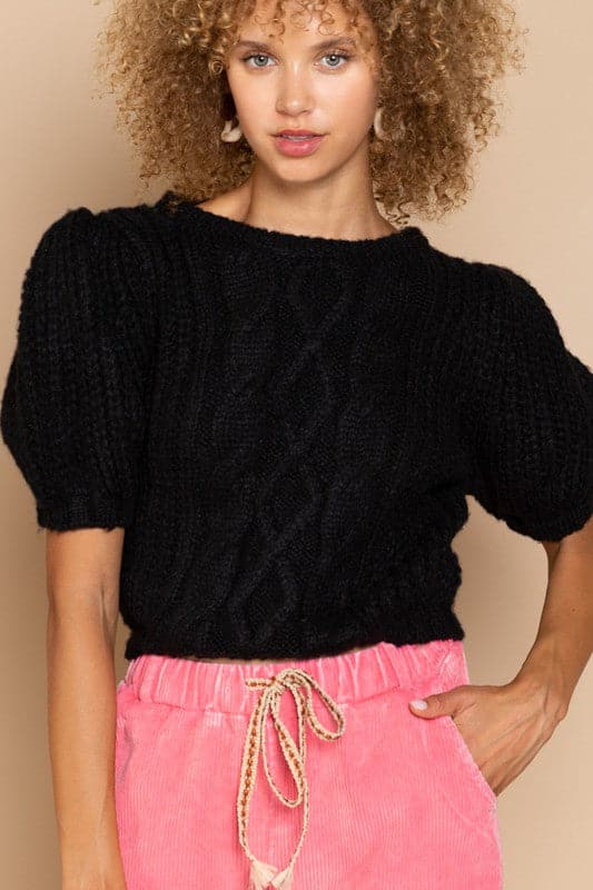 The Parisian Puff Sleeve Sweater is a modern take on a classic cable knit sweater. With a cropped fit, ribbed edge, and short puff sleeve, this sweater is sophisticated, chic and feminine.  Avah Couture