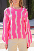 Avah Couture - Are you looking for the perfect transitional weather sweater? This one has a fun, bright pink color, easy-to-wear drop-shoulder styling, and a ribbed round neckline. The vertical wave stripe pattern adds an interesting touch, and the material is stretchy, soft, and super comfy.  Vertical wave stripe pattern Ribbed, round neckline Drop shoulder Long sleeve Oversized fit Short length