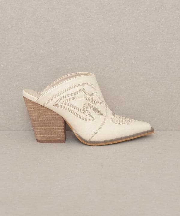 Avah Couture - Are you looking for a heeled mule that has both beauty and comfort? This western-inspired mule will surely draw attention with its gorgeous embroidery, intricate detailing, and heel height. The slip-on style means you can easily combine it with any outfit, from jeans to shorts, to everyday dresses.  Heel Height: 3.5''