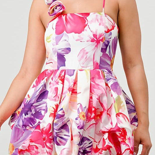 Avah Couture-If you love a sweet, feminine floral dress, this adorable bubble mini is for you. The 3-dimensional rosette on the shoulder strap perfectly complements the beautiful floral print and bubble hem detail. This on-trend mini dress has spaghetti straps and a back zipper and will look great with sandals, pumps, or your new favorite wedges- Pink Purple White 