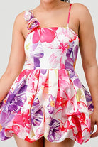 Avah Couture-If you love a sweet, feminine floral dress, this adorable bubble mini is for you. The 3-dimensional rosette on the shoulder strap perfectly complements the beautiful floral print and bubble hem detail. This on-trend mini dress has spaghetti straps and a back zipper and will look great with sandals, pumps, or your new favorite wedges- Pink Purple White 