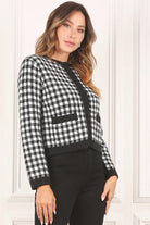 A classic piece that has timeless style, the Black And White Check Jacket is a must have this season. The heavy weight knit fabric features a black and white check pattern that gives it its name. A perfect balance of comfort and style, this jacket features 4 front snap buttons and 2 functional pockets. Wear it with your favorite outfit to work or play a classic piece to get you through any occasion! Avah Couture