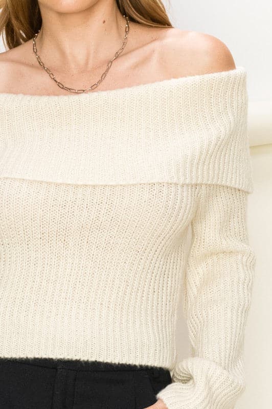 Wear sophistication and elegance in our ribbed off-the-shoulder sweater! The fitted bodice is perfect for tucking into your high rise jeans. Crafted with a fold over off the shoulder neckline and loose long sleeves, this versatile piece will add a feminine touch to any look.