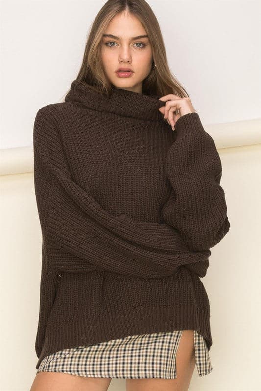 This sweater is perfect for a cozy and comfortable look that’s easy to achieve. The turtleneck, drop shoulders and loose fit sleeves are the ultimate laid back sweater style, while the oversized silhouette gives it a casual vibe for an on trend look. Avah Couture