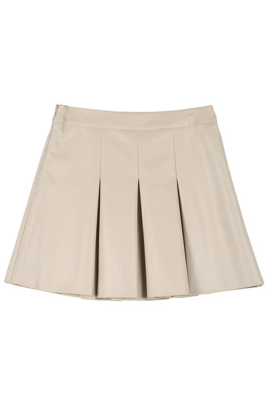 Alexis Pleated Vegan Leather Mini Skirt - Ivory. This vegan leather pleated mini skirt is made of high quality faux leather. The skirt has four pin tucks for each front and back and a side zipper closure. The Alexis Pleated Vegan Mini Skirt will make your legs look longer and slimmer and pairs perfectly with a blouse for work or play! 