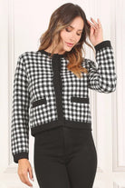 A classic piece that has timeless style, the Black And White Check Jacket is a must have this season. The heavy weight knit fabric features a black and white check pattern that gives it its name. A perfect balance of comfort and style, this jacket features 4 front snap buttons and 2 functional pockets. Wear it with your favorite outfit to work or play a classic piece to get you through any occasion! Avah Couture