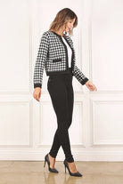 A classic piece that has timeless style, the Black And White Check Jacket is a must have this season. The heavy weight knit fabric features a black and white check pattern that gives it its name. A perfect balance of comfort and style, this jacket features 4 front snap buttons and 2 functional pockets. Wear it with your favorite outfit to work or play a classic piece to get you through any occasion! Avah Couture