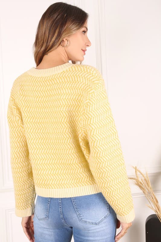 This timeless crew neck sweater with long sleeves will be your go to for years to come in its classic design and comfy fit. The herringbone pattern makes it an excellent piece for dressing up, or down. Avah Couture