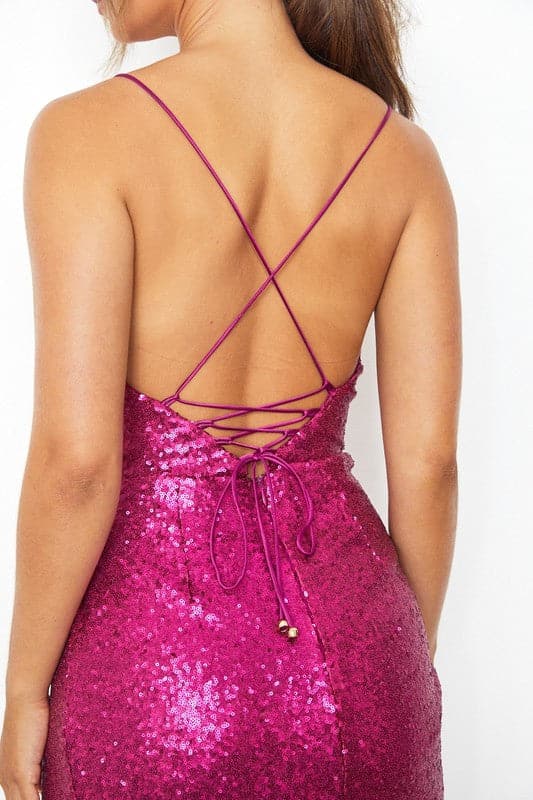 This bodycon dress is the perfect addition to any night on the town. This dress features sequin fabric, a cowl front and draped bodycon fit that lets you feel sexy and show off your shape. Get ready to dazzle all night long when you wear this fun sparkling dress!