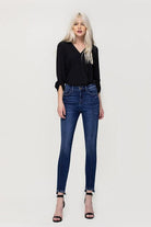 These jeans are cut from comfy stretch denim to sit on your hips and have a high rise that creates a smooth, sculpted shape. We love the ankle skinny fit and uneven hem, perfect to show off your favorite pair of shoes! Avah Couture