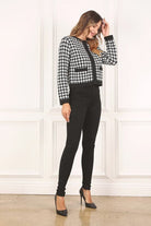 A classic piece that has timeless style, the Black And White Check Jacket is a must have this season. The heavy weight knit fabric features a black and white check pattern that gives it its name. A perfect balance of comfort and style, this jacket features 4 front snap buttons and 2 functional pockets. Wear it with your favorite outfit to work or play a classic piece to get you through any occasion! Avah Couture