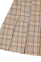 What fun fall will bring with the Baby Baby Plaid Pleated Mini Skirt! Features 6 pin tucks for each front and back and a side zipper. Style with a blouse or sweater with knee high boots, loafers or heels for a fun on trend fall look.  