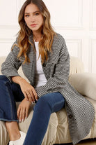 This long shacket is the perfect piece for fall. The houndstooth pattern is so chic seriously stylish. You will look and feel amazing in this shacket. It has a button up front, a shirt collar neckline, long sleeves, a single button at cuff and two chest flap pockets which give it an amazing functionality that makes you look like a million bucks! Avah Couture