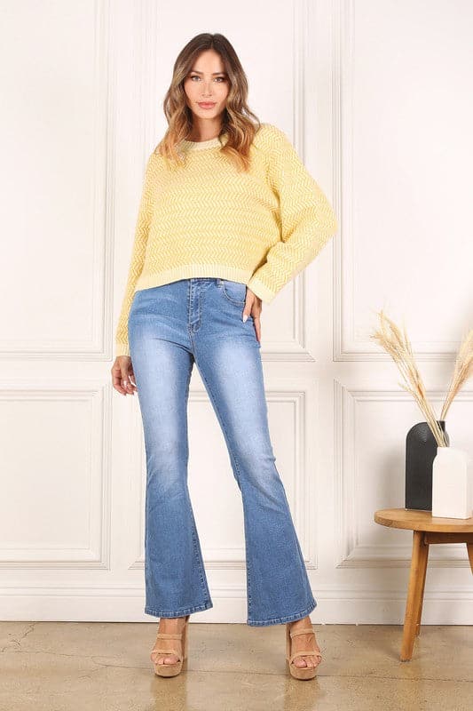 This timeless crew neck sweater with long sleeves will be your go to for years to come in its classic design and comfy fit. The herringbone pattern makes it an excellent piece for dressing up, or down. Avah Couture