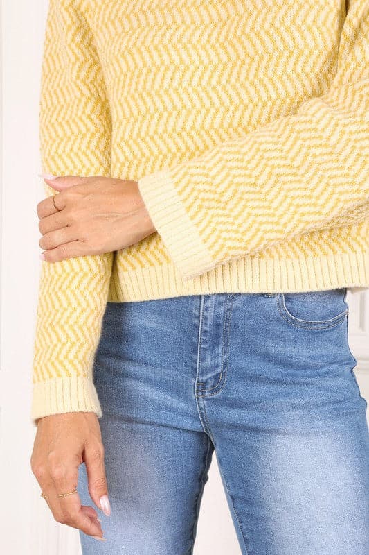 This timeless crew neck sweater with long sleeves will be your go to for years to come in its classic design and comfy fit. The herringbone pattern makes it an excellent piece for dressing up, or down. Avah Couture