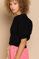 The Parisian Puff Sleeve Sweater is a modern take on a classic cable knit sweater. With a cropped fit, ribbed edge, and short puff sleeve, this sweater is sophisticated, chic and feminine.  Avah Couture