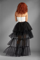 Take your look to the next level with the Berlyn black ruffle tulle skirt. The ultimate in trend and style, this skirt is as fun as it is sexy, and it will give your look an edge that is sure to turn heads - Avah Couture