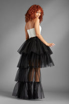 Take your look to the next level with the Berlyn black ruffle tulle skirt. The ultimate in trend and style, this skirt is as fun as it is sexy, and it will give your look an edge that is sure to turn heads - Avah Couture