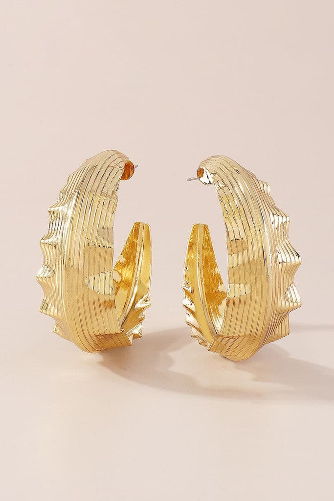A chunky silhouette with a bold presence, these earrings make a great statement piece. The wavy effect adds to the aesthetics of these oversized hoops, making them the ultimate accessory for any occasion. 