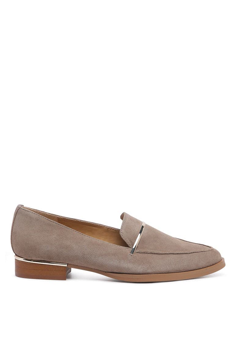 Suede leather loafers with metallic detail. Chic and easy on the feet, these suede slip ons keep your feet relaxed throughout the day when you have great plans to explore! Avah Couture