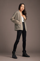 Show off your laid back style in our Lou Lou for You cardigan. The Houndstooth pattern and open front are the perfect combo for a stylish cardigan. Made of soft, poly spandex blend lightweight fabric, it features an open front and two front pockets. A collarless cardigan is also perfect for layering over any outfit. We love it with a crew neck tee shirt or tank, black jeans & boots for the perfect weekend look! Avah Couture