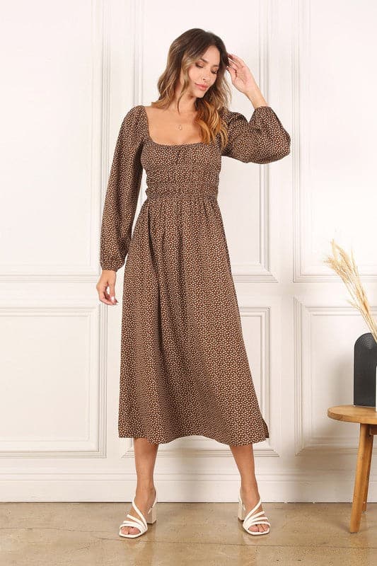 A beautifully feminine and stylish midi dress. Just The Right Touch Square Neck Midi Dress features a square neck, three tier smocked top and puff sleeves for an effortless and flattering silhouette. Crafted with a vintage flare and floral print, this dress is truly perfect for so many occasions. Avah Couture