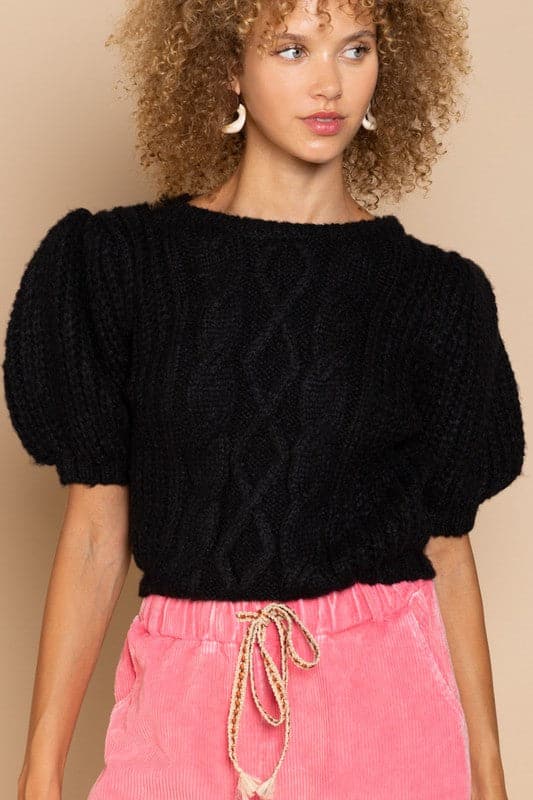The Parisian Puff Sleeve Sweater is a modern take on a classic cable knit sweater. With a cropped fit, ribbed edge, and short puff sleeve, this sweater is sophisticated, chic and feminine.  Avah Couture