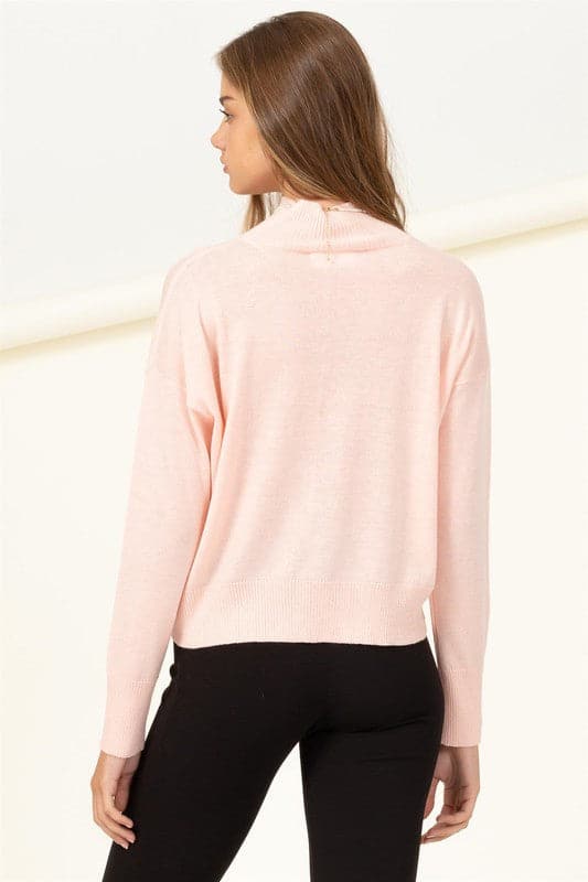 Keep it cozy with this sweater. Designed with a slouchy high neckline, sleeves with drop shoulders and a ribbed hem, you can style this versatile piece with anything. The relaxed, wide cut bodice ensures that you will be comfortable all day long!