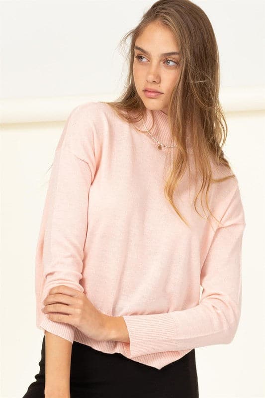 Keep it cozy with this sweater. Designed with a slouchy high neckline, sleeves with drop shoulders and a ribbed hem, you can style this versatile piece with anything. The relaxed, wide cut bodice ensures that you will be comfortable all day long!