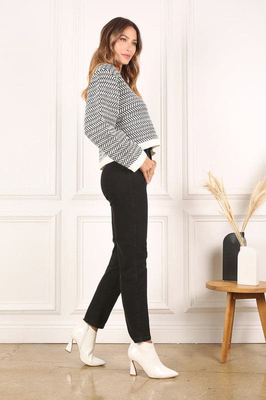This timeless crew neck sweater with long sleeves will be your go to for years to come in its classic design and comfy fit. The herringbone pattern makes it an excellent piece for dressing up, or down. Avah Couture