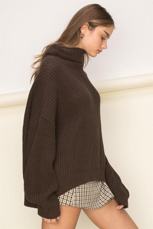 This sweater is perfect for a cozy and comfortable look that’s easy to achieve. The turtleneck, drop shoulders and loose fit sleeves are the ultimate laid back sweater style, while the oversized silhouette gives it a casual vibe for an on trend look. Avah Couture