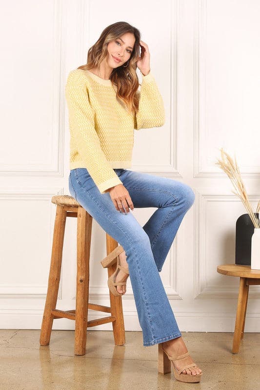 This timeless crew neck sweater with long sleeves will be your go to for years to come in its classic design and comfy fit. The herringbone pattern makes it an excellent piece for dressing up, or down. Avah Couture